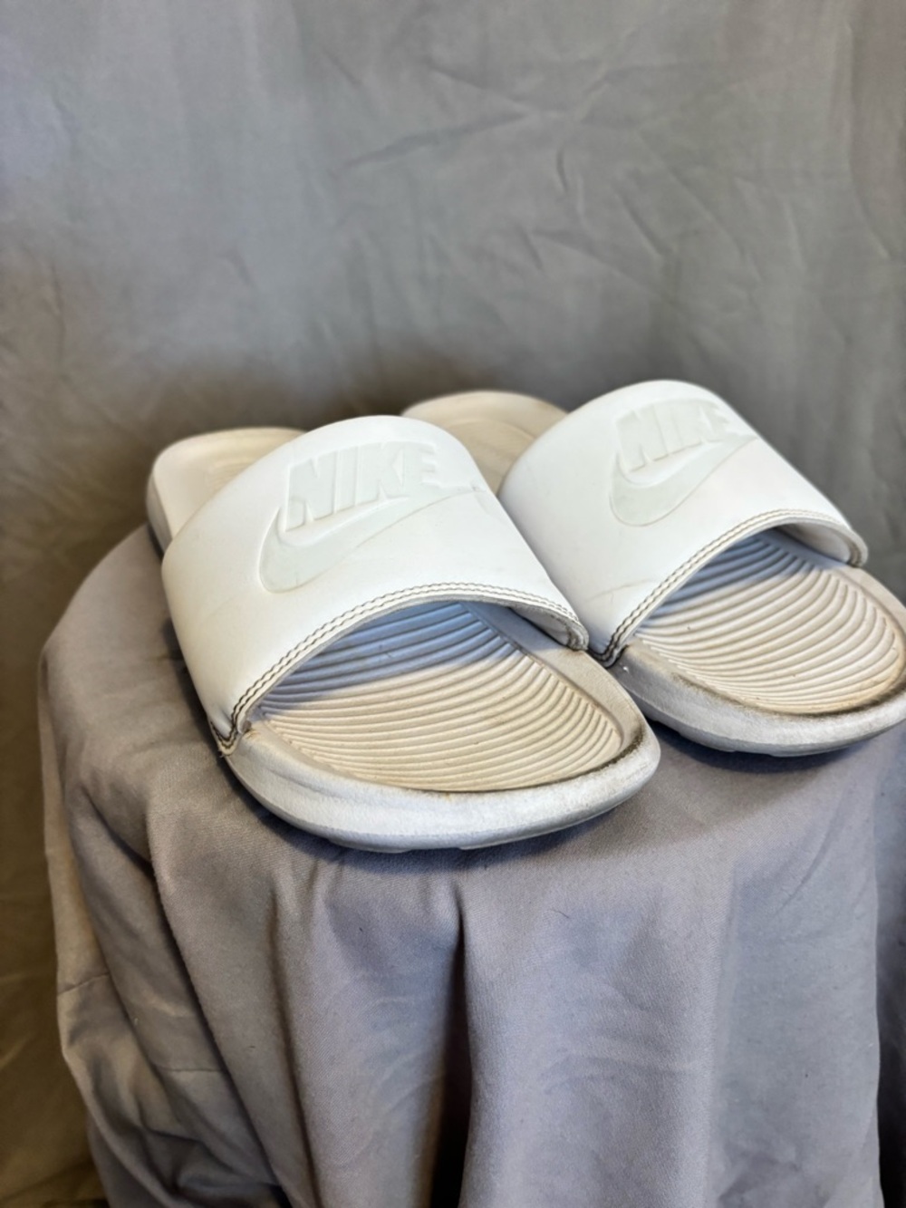 Nike White Slide Sandals with Embossed Logo